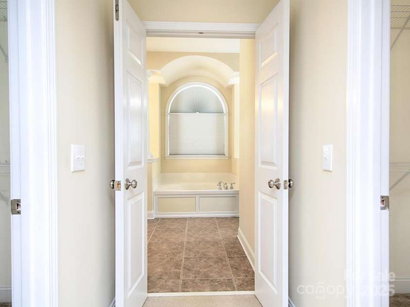 126 Dairy Farm Road, Mooresville, NC 28115.  MLS# CAR4245594, YatesRealty ID 7577. Dual Closets and Double Doors leading to the Primary Bath.