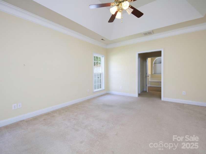126 Dairy Farm Road, Mooresville, NC 28115.  MLS# CAR4245594, YatesRealty ID 7577. Extra Large Private Primary Suite with Deep Tray Ceiling.