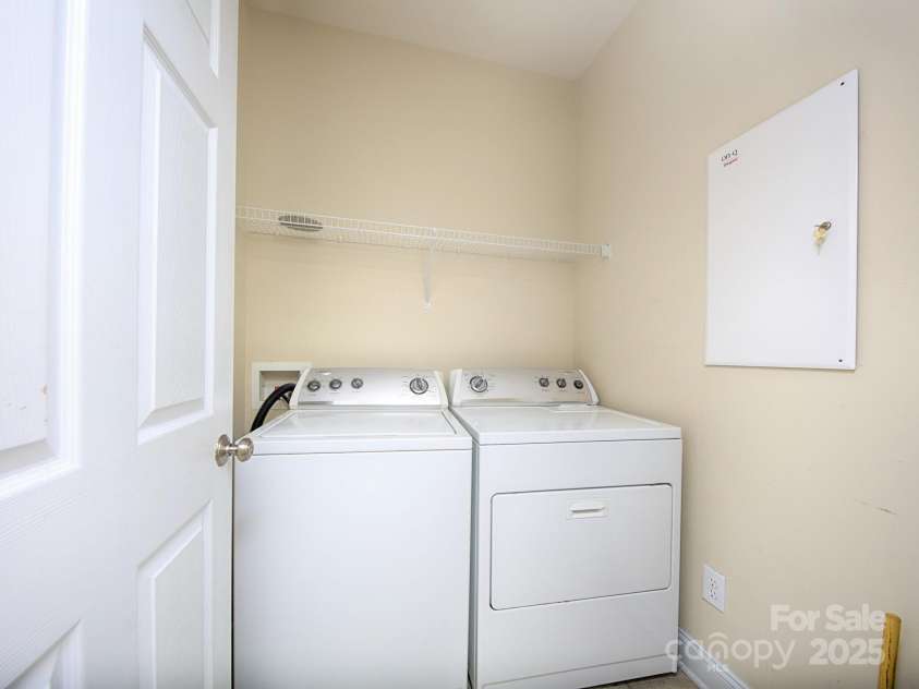 126 Dairy Farm Road, Mooresville, NC 28115.  MLS# CAR4245594, YatesRealty ID 7577. Laundry Room is located next to the Garage.