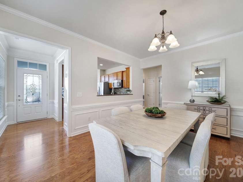 1488 River Bend Boulevard, Fort Mill, SC 29707.  MLS# CAR4329801, YatesRealty ID 7583. Dining area with abundance of crown molding