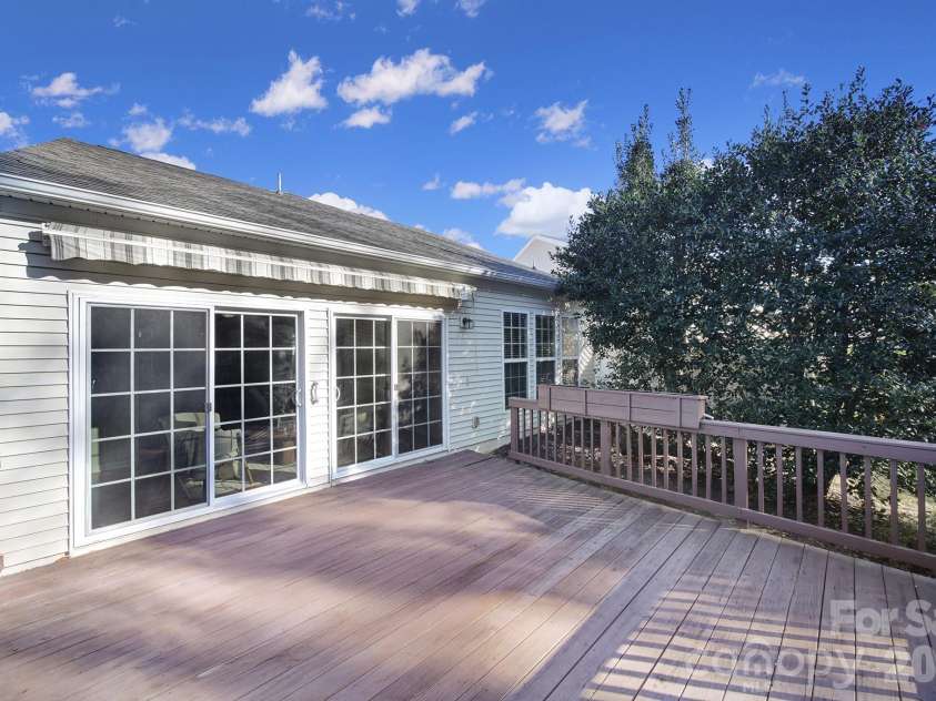 1488 River Bend Boulevard, Fort Mill, SC 29707.  MLS# CAR4329801, YatesRealty ID 7583. Large deck with awning