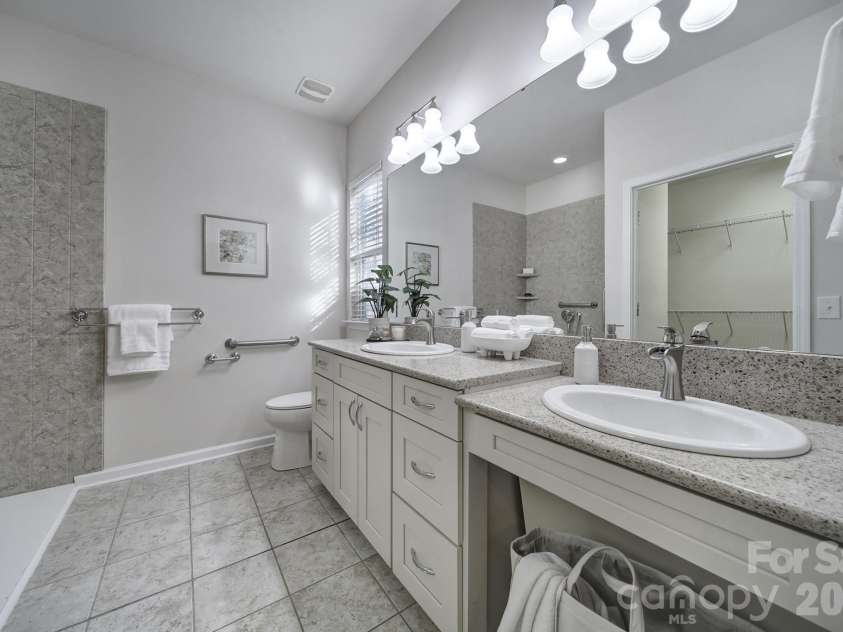 1488 River Bend Boulevard, Fort Mill, SC 29707.  MLS# CAR4329801, YatesRealty ID 7583. Primary bathroom with a double vanity