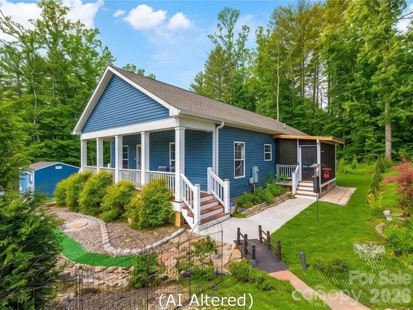 83 Moss Hill Drive, Hendersonville, NC 28792.  MLS# CAR4327286, YatesRealty ID 7589. Landscaping AI enhanced for summer