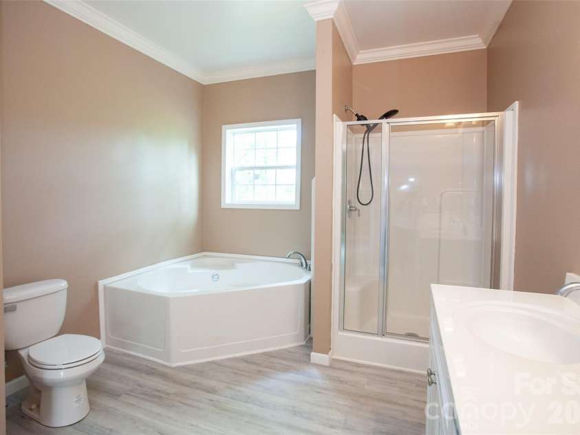 83 Moss Hill Drive, Hendersonville, NC 28792.  MLS# CAR4327286, YatesRealty ID 7589. Primary Bathroom with double sinks