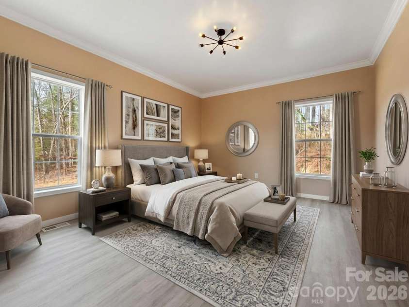 83 Moss Hill Drive, Hendersonville, NC 28792.  MLS# CAR4327286, YatesRealty ID 7589. Primary Bedroom Virtually Staged