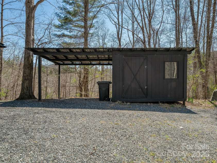 55 Clover Trail, Marshall, NC 28753.  MLS# CAR4231147, YatesRealty ID 7592. Single Carport/Storage