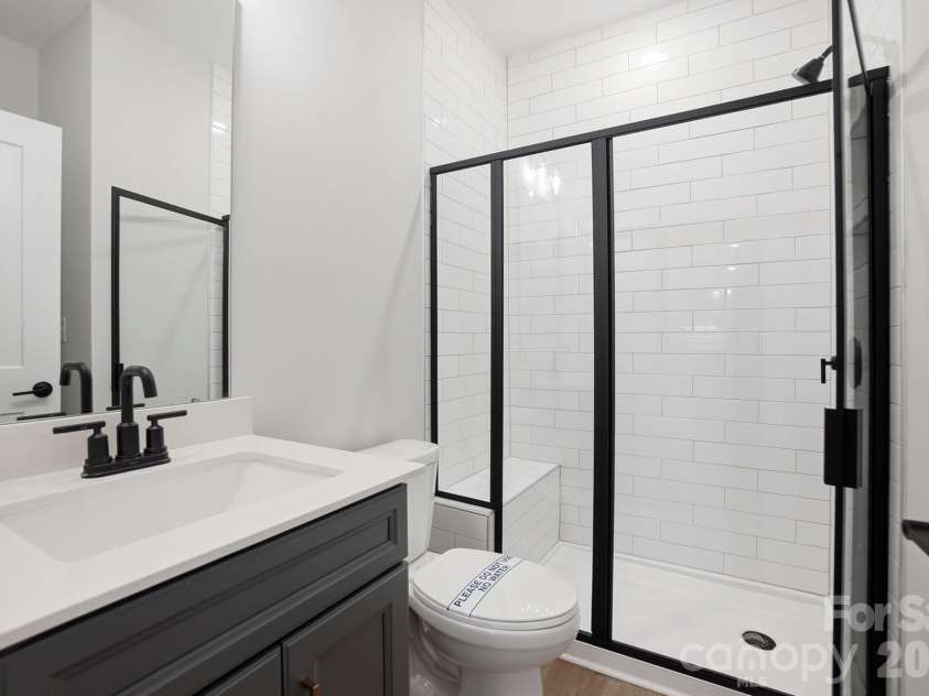 5080 McLaughlin Loop, Waxhaw, NC 28173.  MLS# CAR4349014, YatesRealty ID 7598. Guest Bath