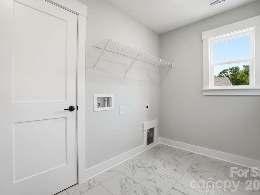 5080 McLaughlin Loop, Waxhaw, NC 28173.  MLS# CAR4349014, YatesRealty ID 7598. Laundry Room
