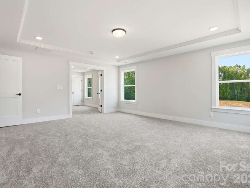 5080 McLaughlin Loop, Waxhaw, NC 28173.  MLS# CAR4349014, YatesRealty ID 7598. Primary Bedroom