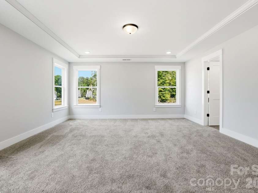 5080 McLaughlin Loop, Waxhaw, NC 28173.  MLS# CAR4349014, YatesRealty ID 7598. Primary Bedroom