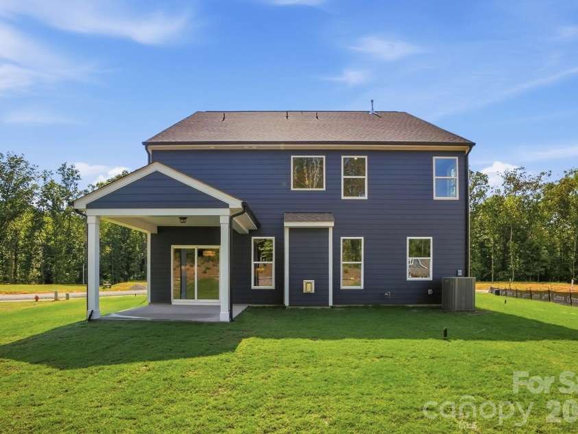 5080 McLaughlin Loop, Waxhaw, NC 28173.  MLS# CAR4349014, YatesRealty ID 7598. Rear of home
