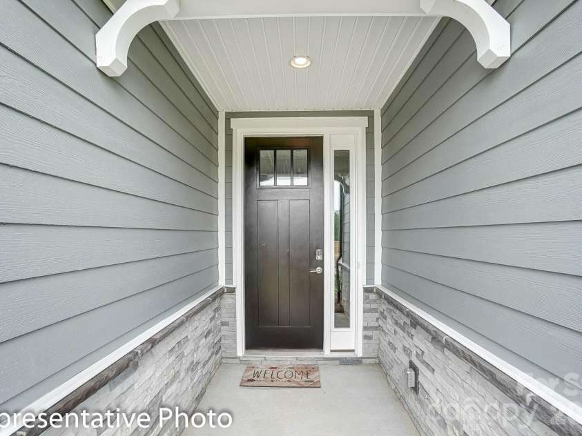 4010 Cedar Falls Drive, Waxhaw, NC 28173.  MLS# CAR4325530, YatesRealty ID 7599. Covered front entry