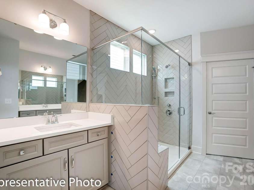 4010 Cedar Falls Drive, Waxhaw, NC 28173.  MLS# CAR4325530, YatesRealty ID 7599. Primary bath with optional luxury shower