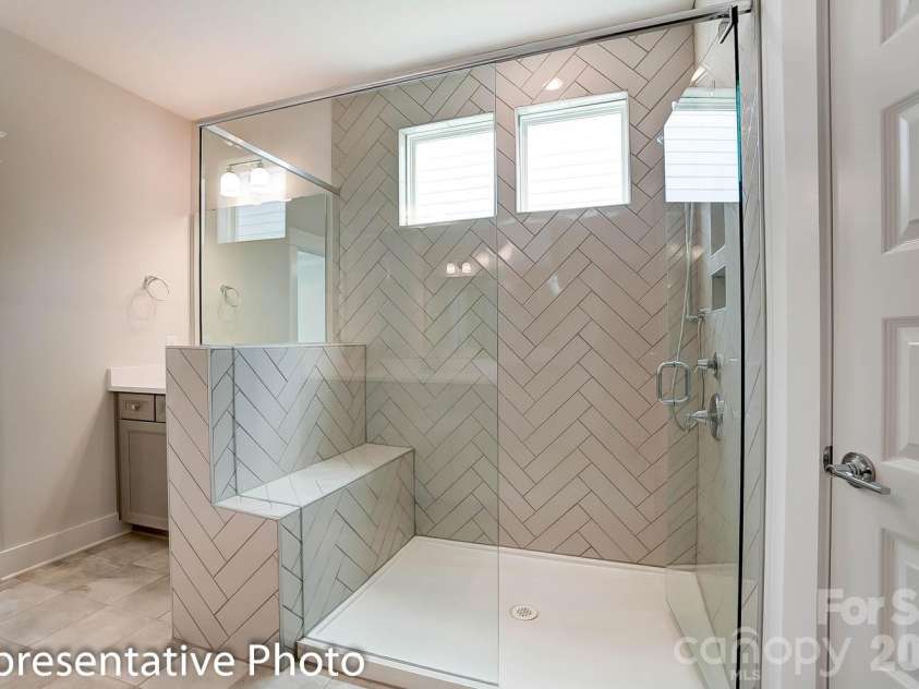 4010 Cedar Falls Drive, Waxhaw, NC 28173.  MLS# CAR4325530, YatesRealty ID 7599. Primary bath with optional luxury shower