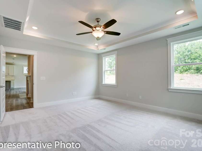 4010 Cedar Falls Drive, Waxhaw, NC 28173.  MLS# CAR4325530, YatesRealty ID 7599. Primary bedroom with optional tray ceiling