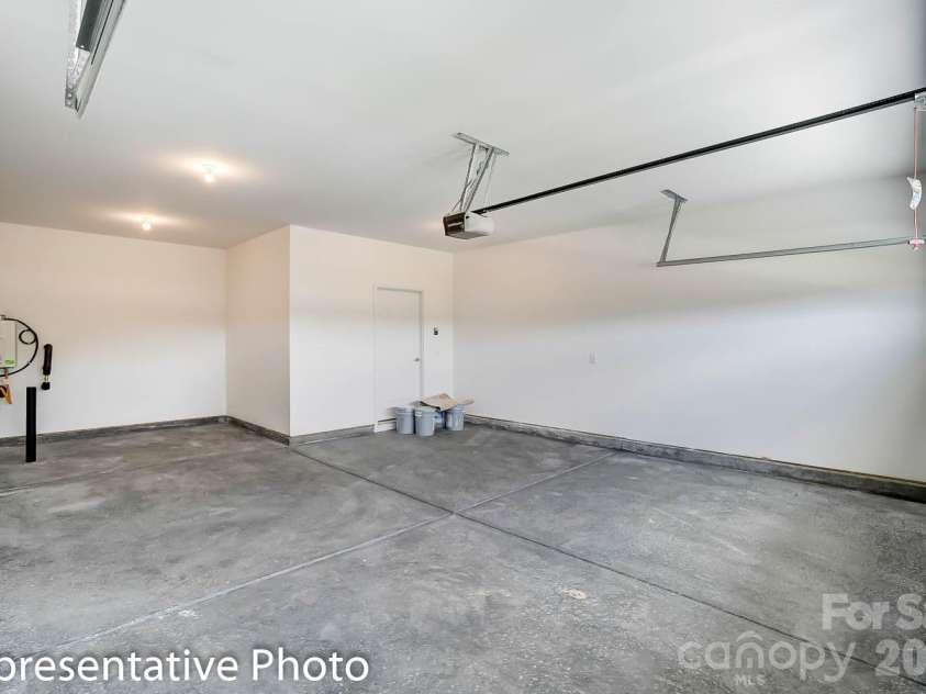 4010 Cedar Falls Drive, Waxhaw, NC 28173.  MLS# CAR4325530, YatesRealty ID 7599. Storage area in garage