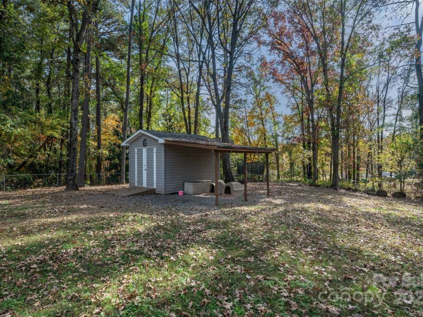 302 Nottingham Way, Wadesboro, NC 28170.  MLS# CAR4316786, YatesRealty ID 760. Backyard Storage Shed