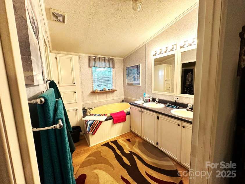 251 Rainbow Rapids Road, Rutherfordton, NC 28139.  MLS# CAR4161687, YatesRealty ID 7605. Primary Bath