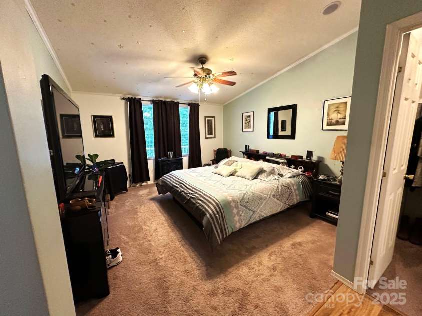 251 Rainbow Rapids Road, Rutherfordton, NC 28139.  MLS# CAR4161687, YatesRealty ID 7605. Primary bedroom