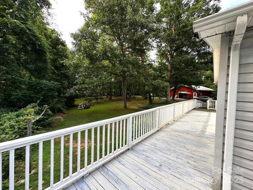 251 Rainbow Rapids Road, Rutherfordton, NC 28139.  MLS# CAR4161687, YatesRealty ID 7605. Side deck - wrap around