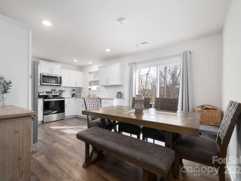 40 Malcolm Court, Candler, NC 28715.  MLS# CAR4281159, YatesRealty ID 761. Dining Area has Outside Access 