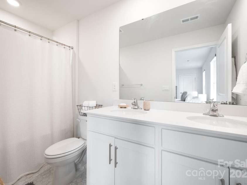 40 Malcolm Court, Candler, NC 28715.  MLS# CAR4281159, YatesRealty ID 761. Primary Bath Has Dual Sinks 