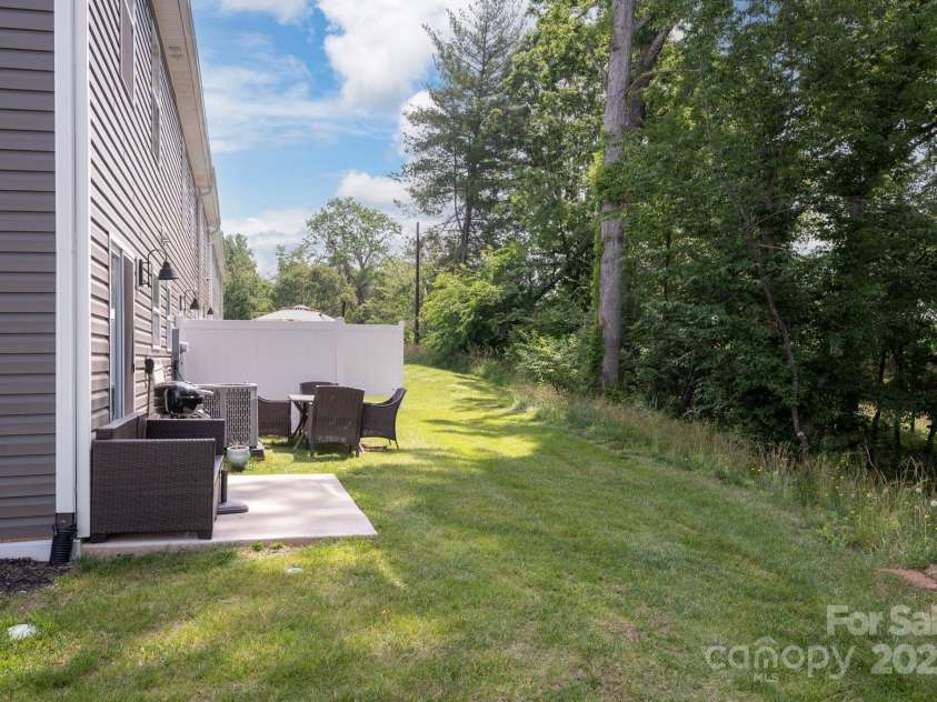 40 Malcolm Court, Candler, NC 28715.  MLS# CAR4281159, YatesRealty ID 761. Private Back Patio 
