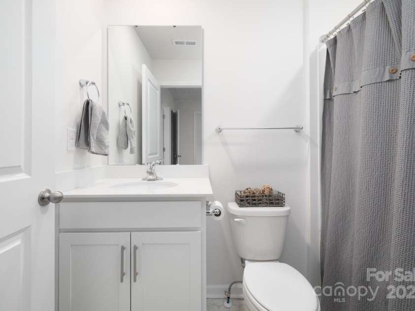 40 Malcolm Court, Candler, NC 28715.  MLS# CAR4281159, YatesRealty ID 761. Second Floor Guest Bath 