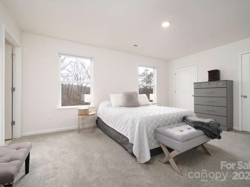 40 Malcolm Court, Candler, NC 28715.  MLS# CAR4281159, YatesRealty ID 761. Spacious Primary Bedroom