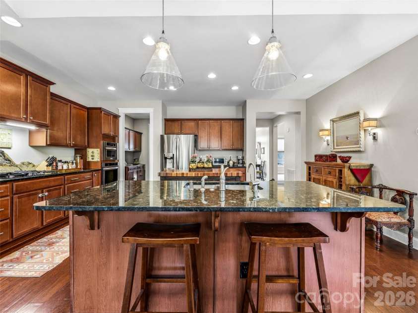 70 Greenwells Glory Drive, Biltmore Lake, NC 28715.  MLS# CAR4353644, YatesRealty ID 7618. Work spaces and storage spaces galore!  