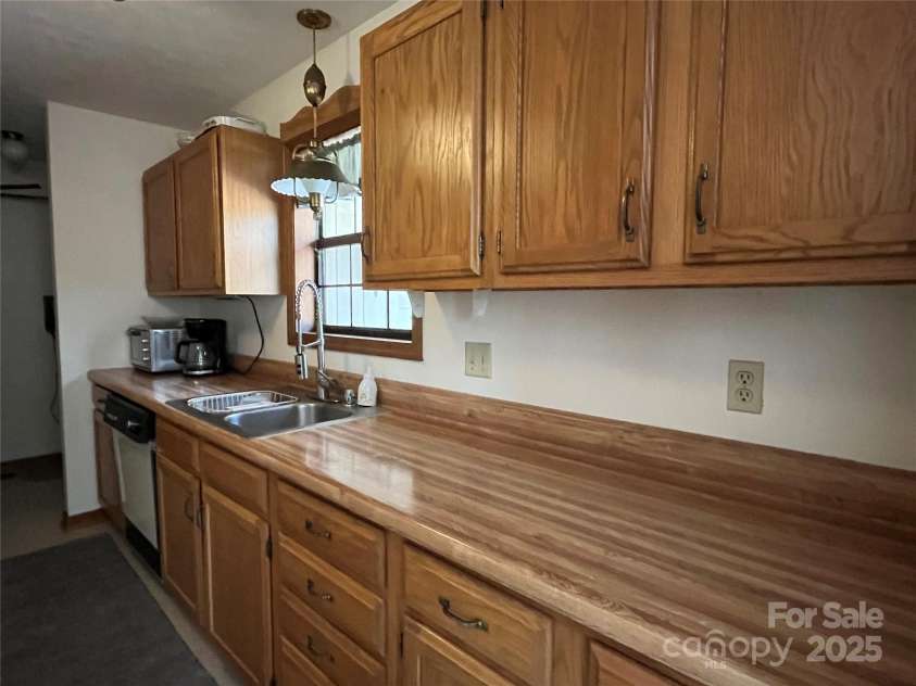 585 Purple Finch Road, Brevard, NC 28712.  MLS# CAR4208829, YatesRealty ID 7621. 