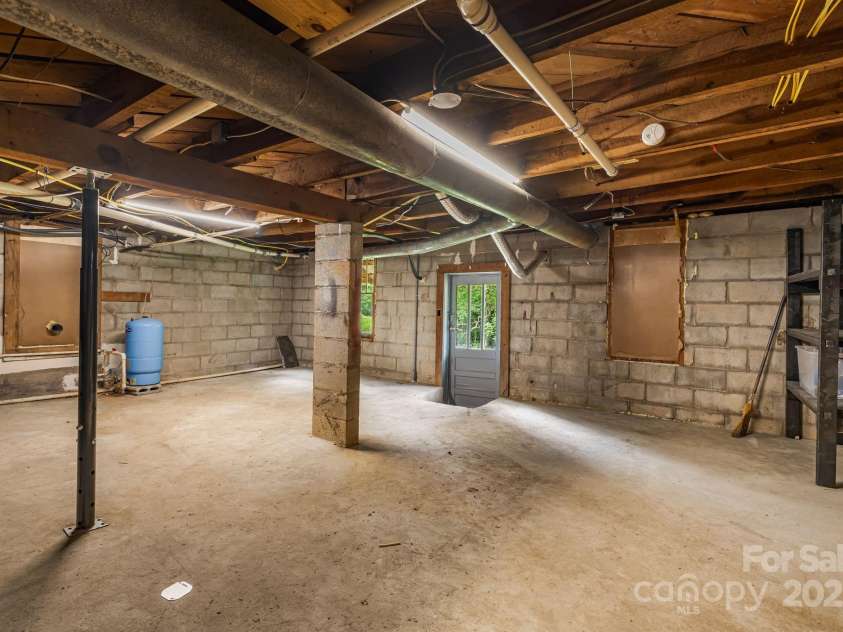 8171 Sugar Hill Road, Marion, NC 28752.  MLS# CAR4296295, YatesRealty ID 7625. Basement