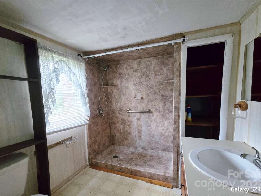 410 Cole Campbell Road, Taylorsville, NC 28681.  MLS# CAR4231804, YatesRealty ID 7626. 