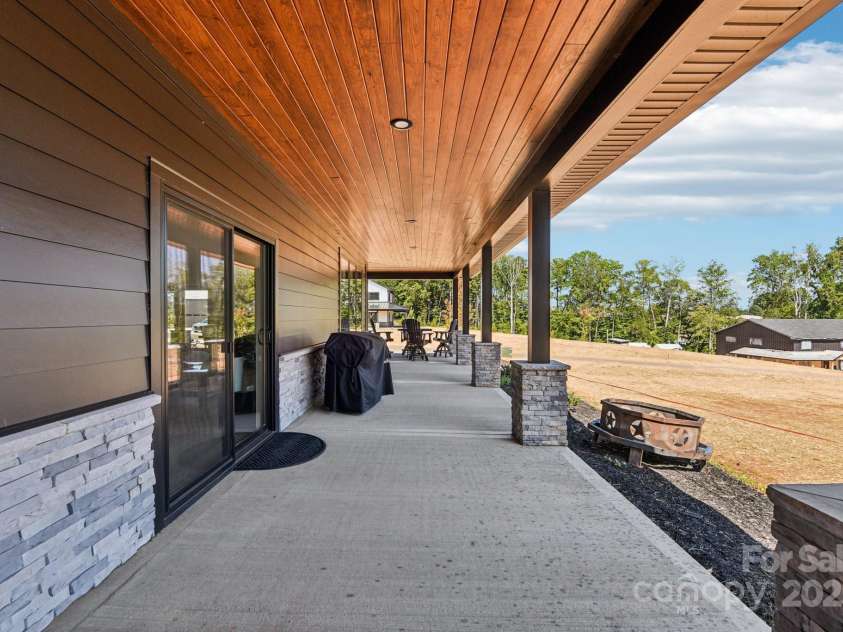 108 Winners Circle, Mooresville, NC 28117.  MLS# CAR4301137, YatesRealty ID 7627. Over 1,000 SF of covered porch