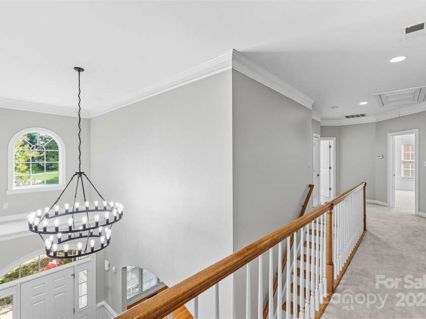 11139 Tradition View Drive, Charlotte, NC 28269.  MLS# CAR4306153, YatesRealty ID 7629. Upper Hallway - New Chandelier
