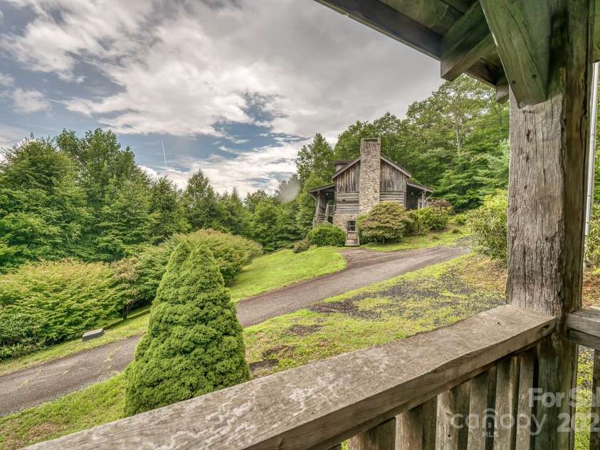 184 Dover Lane, Spruce Pine, NC 28777.  MLS# CAR4164816, YatesRealty ID 763. View from Guest house toward Main house
