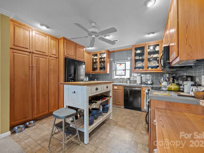 457 Overlook Drive, Spruce Pine, NC 287777.  MLS# CAR4245586, YatesRealty ID 7633. Custom all-wood cabinetry