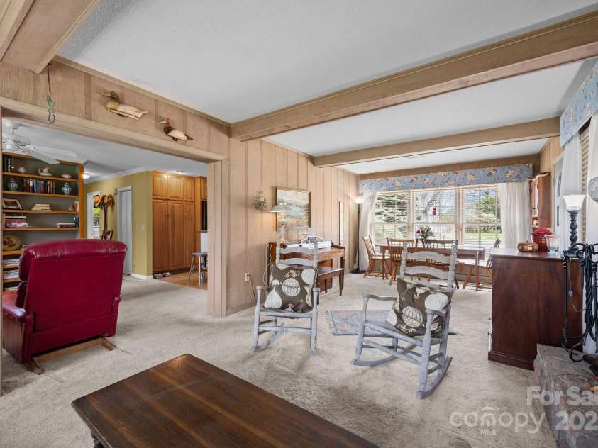 457 Overlook Drive, Spruce Pine, NC 287777.  MLS# CAR4245586, YatesRealty ID 7633. Living area opens in to kitchen