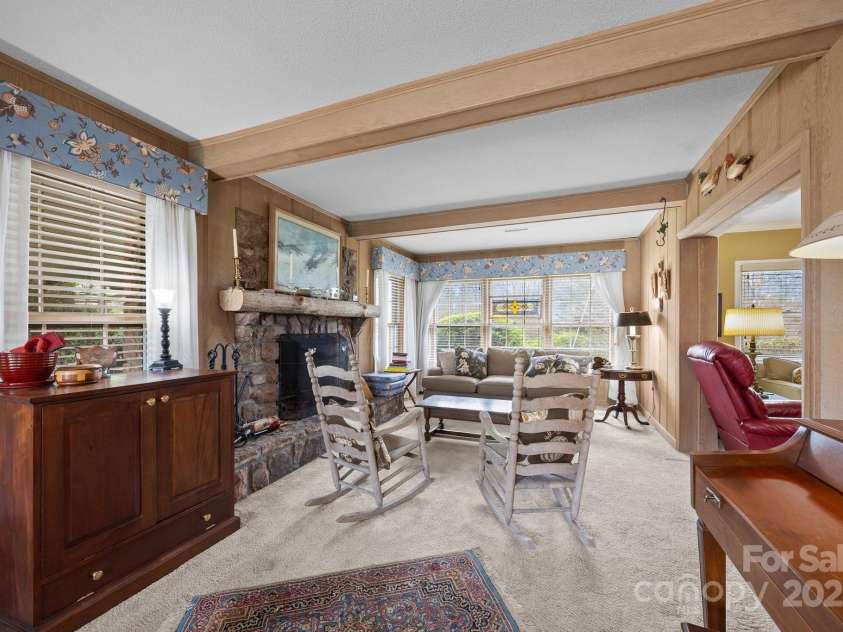 457 Overlook Drive, Spruce Pine, NC 287777.  MLS# CAR4245586, YatesRealty ID 7633. Wood-burning fireplace 