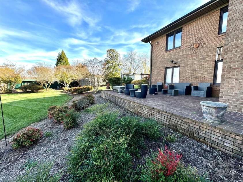 121 48th Avenue, Hickory, NC 28601.  MLS# CAR4203042, YatesRealty ID 7636. BACK OF HOME WITH SITTING/ENTERTAINING AREA