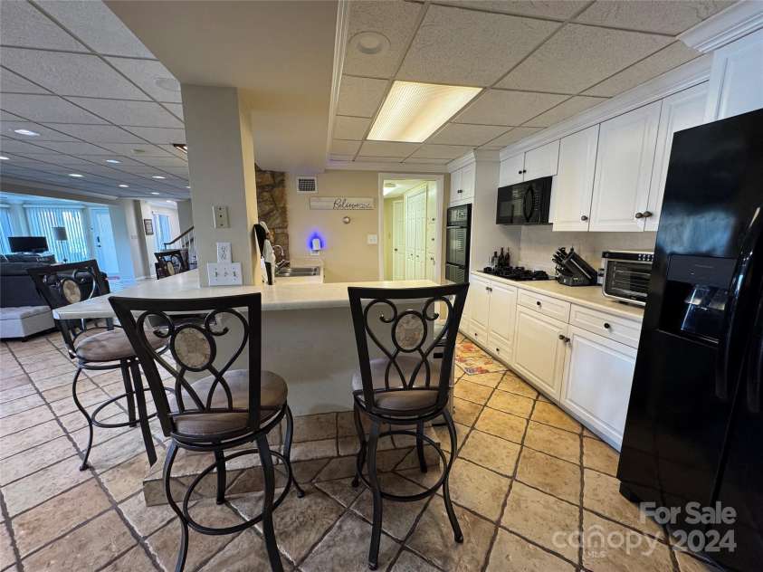 121 48th Avenue, Hickory, NC 28601.  MLS# CAR4203042, YatesRealty ID 7636. LOWER LEVEL KITCHEN