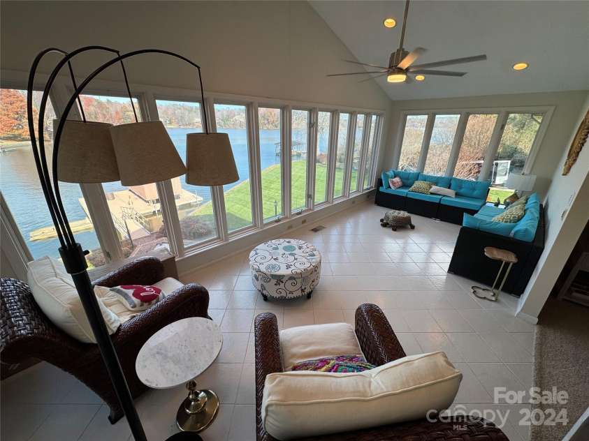 121 48th Avenue, Hickory, NC 28601.  MLS# CAR4203042, YatesRealty ID 7636. SUNROOM WITH LAKE VIEW-MAIN LEVEL
