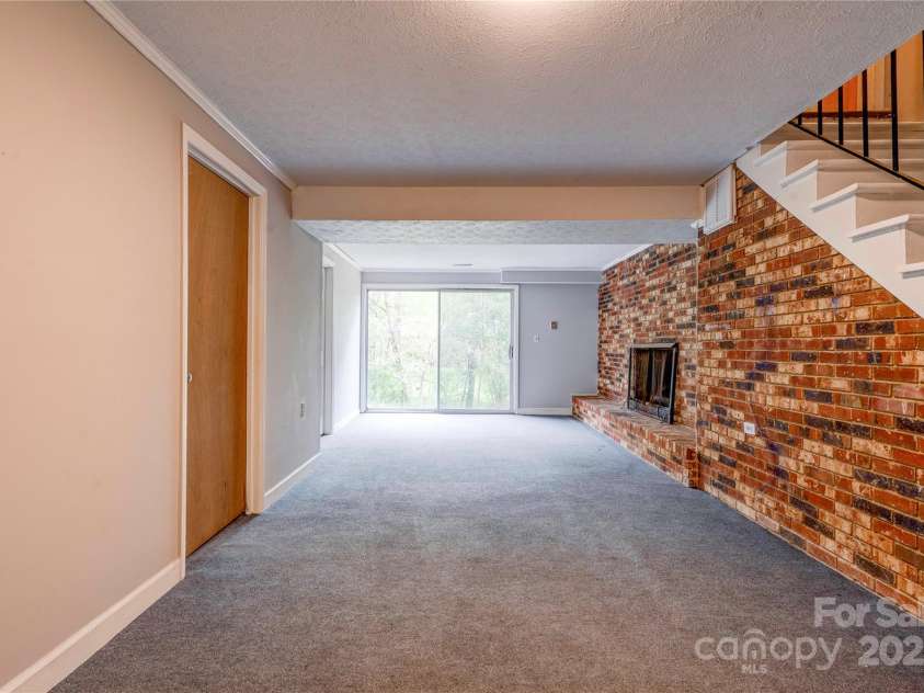 910 Surry Drive, Shelby, NC 28152.  MLS# CAR4249425, YatesRealty ID 7637. Family Room- Basement