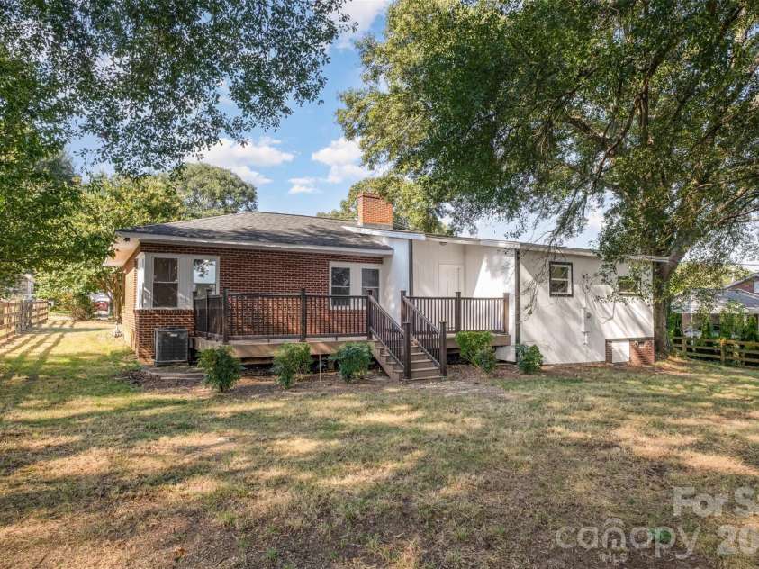 901 Elm Street, Shelby, NC 28150.  MLS# CAR4298786, YatesRealty ID 7640. Backyard and sizeable deck