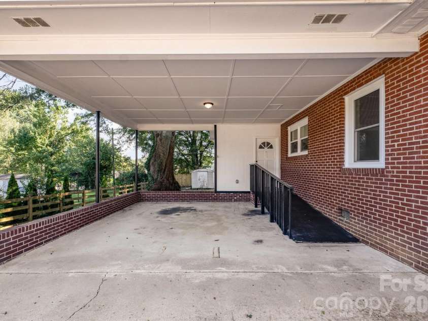 901 Elm Street, Shelby, NC 28150.  MLS# CAR4298786, YatesRealty ID 7640. Carport 
