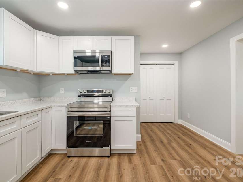 901 Elm Street, Shelby, NC 28150.  MLS# CAR4298786, YatesRealty ID 7640. Kitchen view towards backyard exit