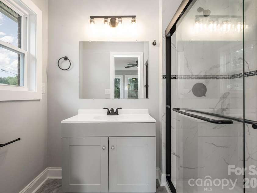 901 Elm Street, Shelby, NC 28150.  MLS# CAR4298786, YatesRealty ID 7640. Primary bathroom