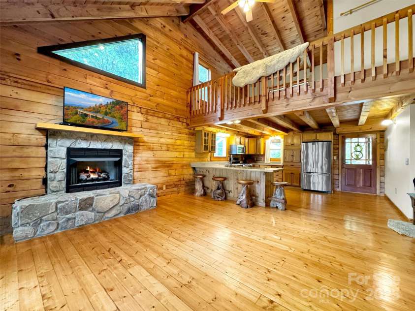 500 Beechwood Drive, Sylva, NC 28779.  MLS# CAR4271075, YatesRealty ID 7652. Glistening Knotty Pine Floors