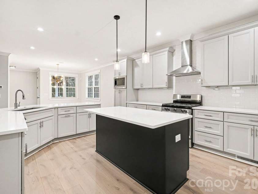 2305 Sanders Avenue, Charlotte, NC 28216.  MLS# CAR4421122, YatesRealty ID 7657. 