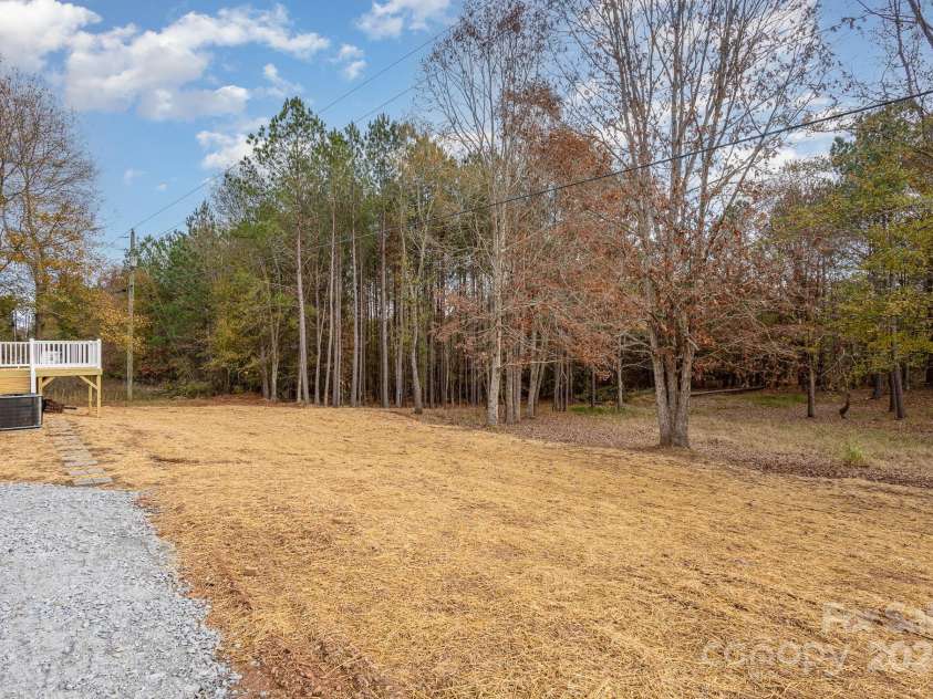 146 Lionel Street, Mooresboro, NC 28114.  MLS# CAR4205731, YatesRealty ID 7660. Backyard